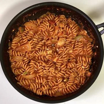Perfectly cooked pasta with a tender bite, coated in rich, savory sauceoffe.. Stock Photos