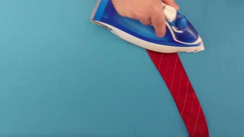 Perfectly Pressed Ties: Quick Ironing Hack Stock Footage 305321636
