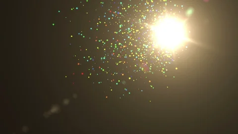 Perfectly seamless loop features glowing colorful particles that float across Stock Footage 128950260