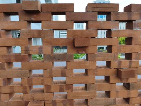 Perforated brick work screen wall Stock Photos