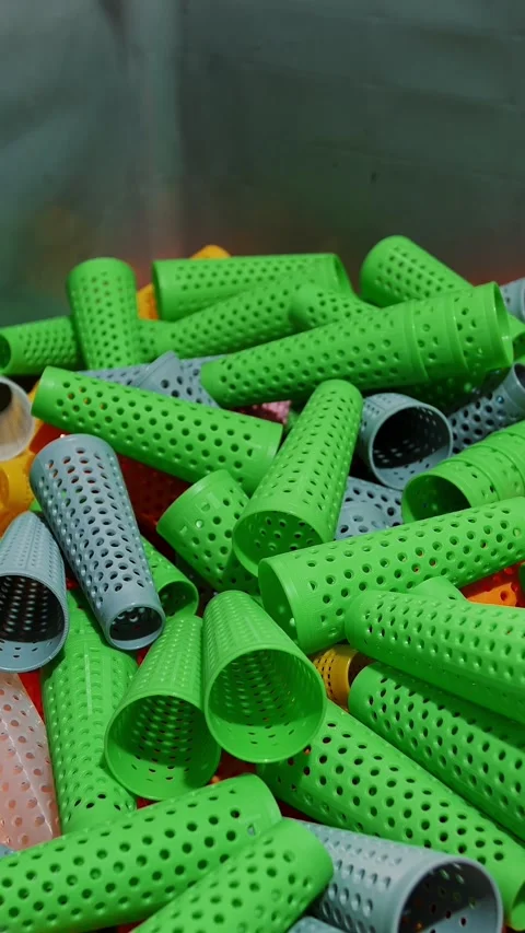 Perforated coloring tubes in a large basket. Threads production. Yarn making Stock Footage 318351487