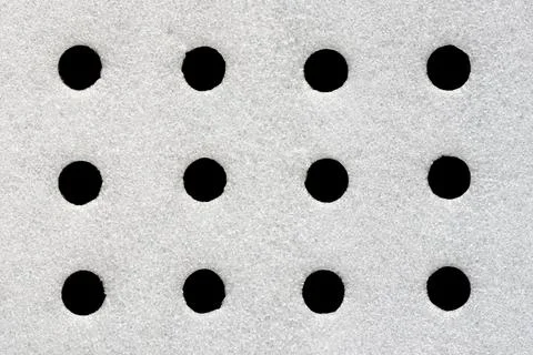 Perforated expanded polyethylene packaging foam used as and shock absorber Stock Photos