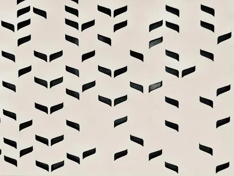 Perforated little leaf shape on white wood wall 写真素材