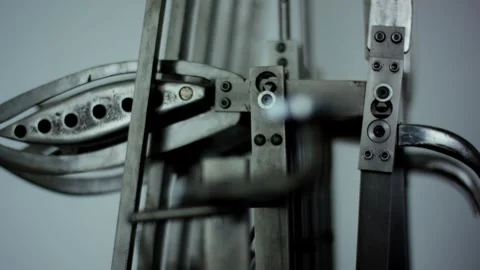 Perforated Metal Part in a Mechanical Testing Machine, Steel Fixture, Close Up Stock Footage 341442154