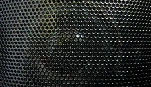 Perforated Metal Texture Close-Up Фото
