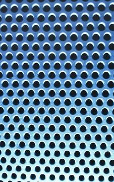 Perforated Metallic Surface with Blue Lighting Abstract Background Stock Photos