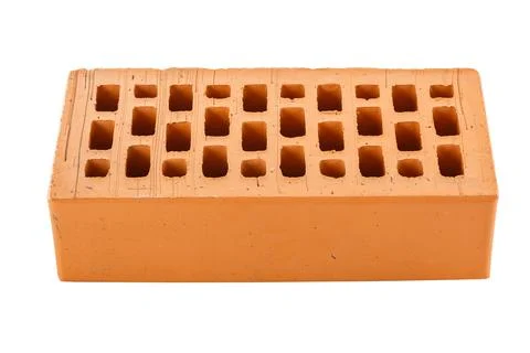 Perforated red brick isolated on white background Stock Photos