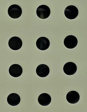 Perforated surface abstract pattern geometric background Stock Photos