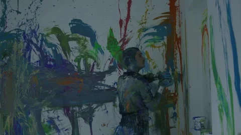Perform art of a man dancing bathed in colored paint Stock Footage 255352807