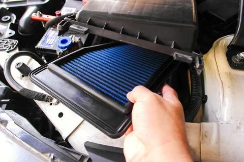 Performance Air Filter Install to Shock Absorber Stock Photos