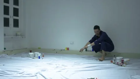Performance art of a dancing man express freestyle painting Stock Footage 255599662