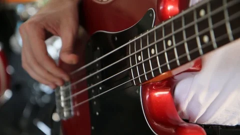 The performance of the bass guitar. Stock Footage 98393484