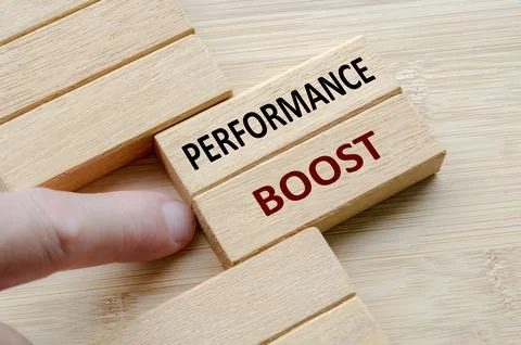 PERFORMANCE BOOST text on wooden blocks, Targeted methods designed to deliv.. Stock Photos