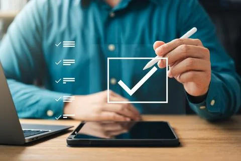 Performance checklist and tracking business performance, businessman using .. Stock Photos