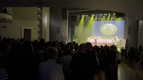 Performance of the folk choir in a concert hall with a large audience. Stock Footage 236925749