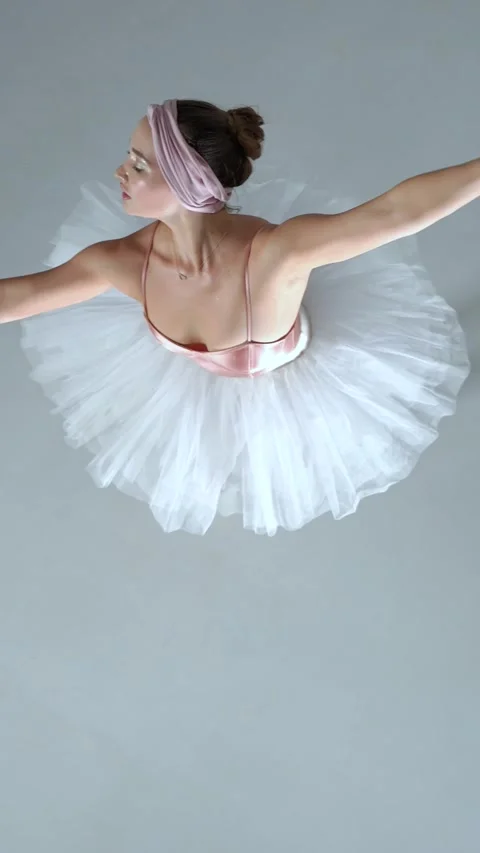 Performance, graceful ballerina in a pink tutu dance and perform dramatic Stock Footage 293675729