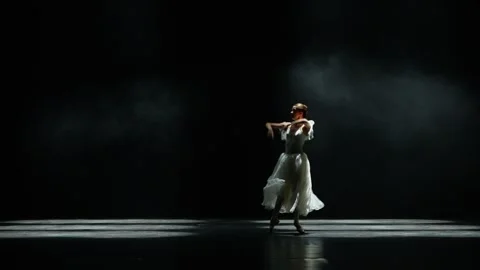 Performance, graceful ballerina in a white tutu dance and perform dramatic Stock Footage 249727781