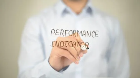 Performance Indicators, man writing on transparent screen Stock Photos