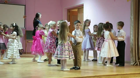 adults and children play freeze dance at, Stock Video