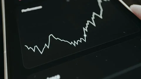 A Performance line chart displaying a moving marker across the plotted line Stock Footage 332912186