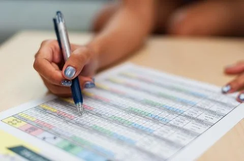 Performance metrics analysis in an office environment a close-up perspectiv.. Stock Photos