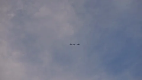 Performance of Russian airplanes in the sky over the city. Video stock 127815939