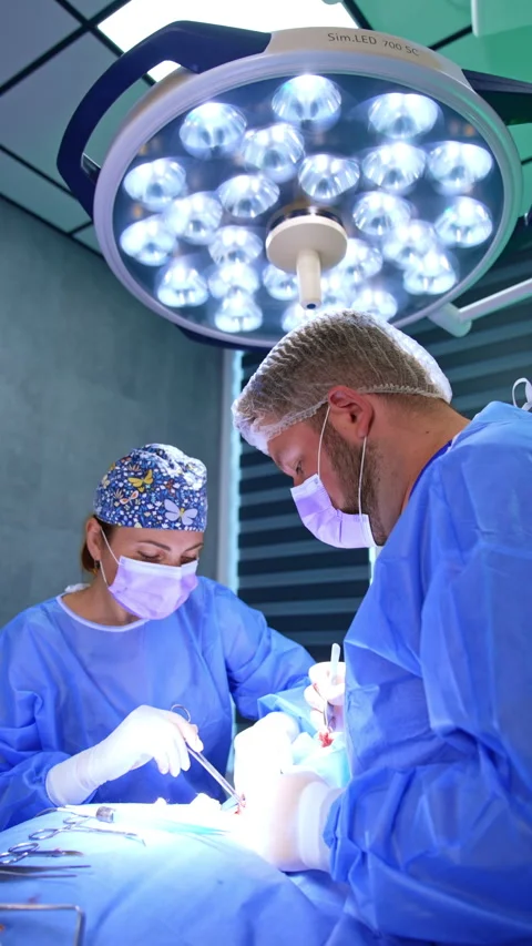 Performance of thyroid surgery in modern hospital.  Video stock 299690458