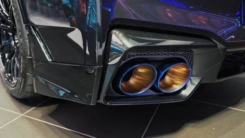 Performance Vehicle Titanium Exhaust Tips and Rear Diffuser Detail Stock Footage 337782518