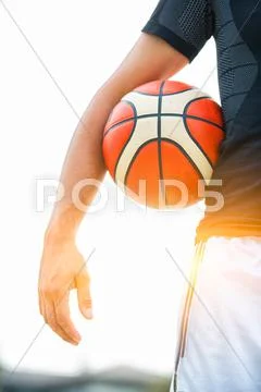 Performance of a white basketball player in the field of road Stock Photos