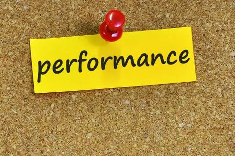 Performance  word on notes paper with cork background Foto stock