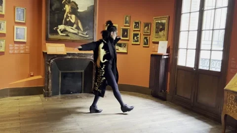 Performer in costume at Jean-Jacques Henner National Museum in Paris Stock Footage 315468047