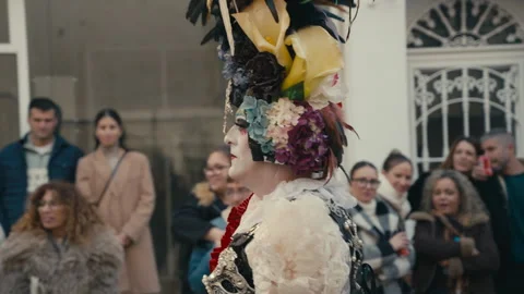 Performer With Dramatic Floral Headpiece And Theatrical Makeup At Spanish 動画素材 332140506