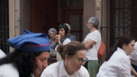 Performers doing a traditional Correfoc dance in the streets of Barcelona Stock Footage 100389499