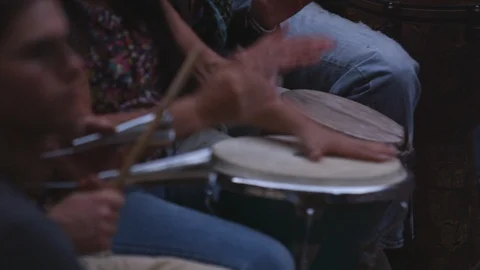 Performers playing drums and percussion instruments during drum circle Stock Footage 103432428
