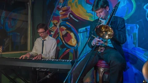 Performers on stage are making sure the music is amazing Stock Footage 112190339