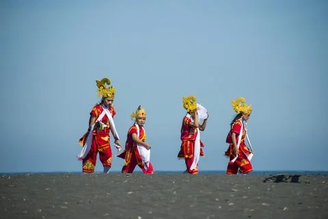 Performers walk backstage before joining the colossal show Stock Photos