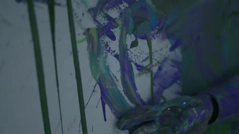 Performing art of a man dancing bathed in colored paint Stock Footage 255352837