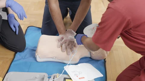 Performing first aid procedure on mannequin Video stock 272229034