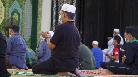 Performing Friday prayer in mosque during pandemic in KL Stock Footage 142041150