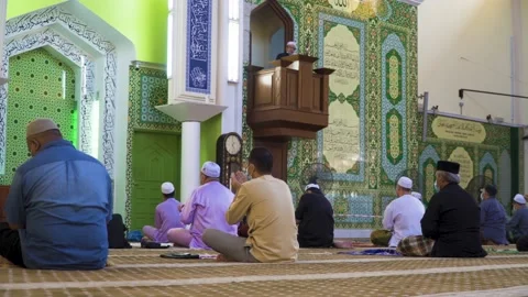 Performing Friday prayer in mosque during pandemic in KL Stock Footage 142041257