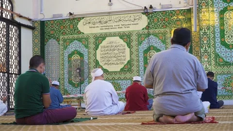 Performing Friday prayer in mosque during pandemic in KL Stock Footage 142041258