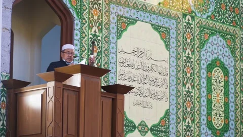 Performing Friday prayer in mosque during pandemic in KL Stock Footage 142041260