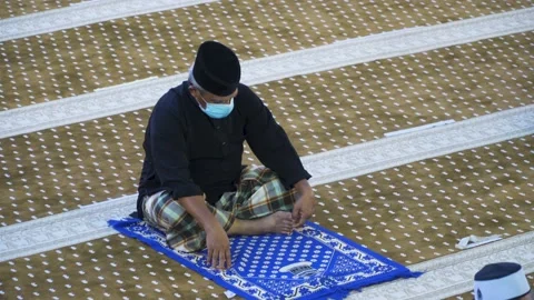 Performing Friday prayer in mosque during pandemic in KL Stock Footage 142041336