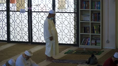 Performing Friday prayer in mosque during pandemic in KL Stock Footage 142041358