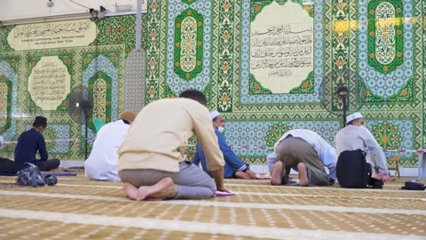 Performing Friday prayer in mosque during pandemic in KL Stock Footage 142041473