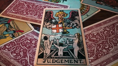 Performing Future-telling medieval Tarot Judgement card reading ritual Stock Footage 250780377