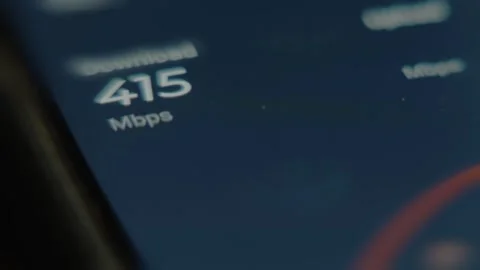 Performing the Internet Speed Test, checking Download Speed maximum Mbps, macro Stock Footage 291526847