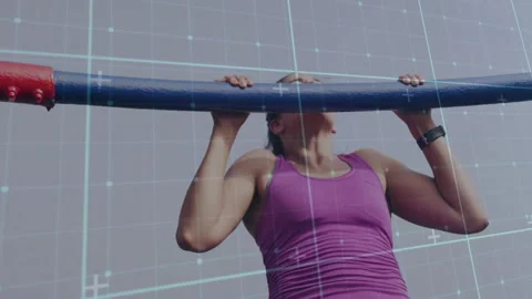 Performing pull-ups, woman exercising over grid pattern animation Stock Footage 305132554