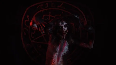 Performing a ritual demon dances on the pentagram, montage Stock Footage 88576127