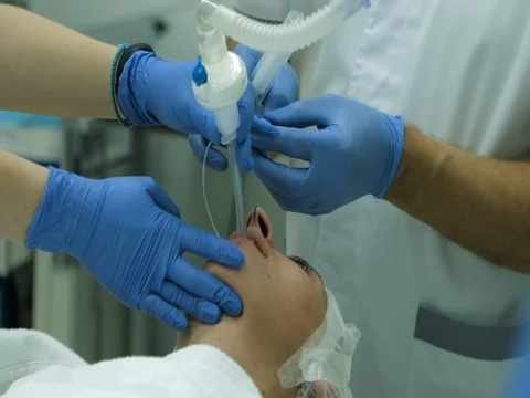 Performing surgery in operation room Video stock 81373590